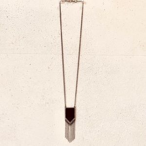 Brassy Long Chain Necklace with Black Geometric Pendant.